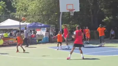 Thousands attend ‘Scoops & Hoops’ event in Mattapan to benefit Youth in Crisis organization